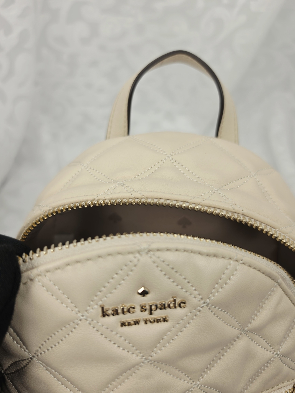 kate spade New York Quilted Cream Mini Backpack - Picture 7 of 10